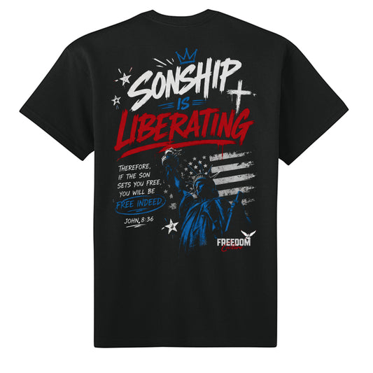 A black short-sleeve t-shirt with a large patriotic graphic on the front. The graphic features the text 'SONSHIP IS LIBERATING' in white and red, a blue crown, a blue and white distressed American flag, a statue of a soldier, and a quote from John 8:36.